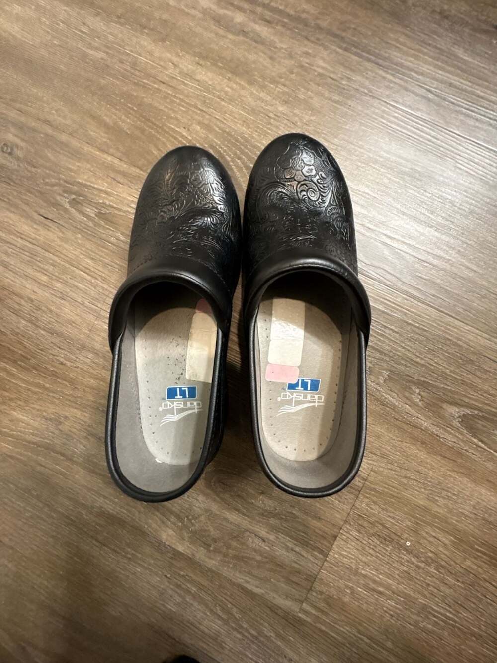 Dansko LT Pro Black Floral Tooled Clogs